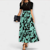 Luna - Zomerjurk met bloemenprint en ronde hals