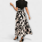 Luna - Zomerjurk met bloemenprint en ronde hals