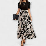 Luna - Zomerjurk met bloemenprint en ronde hals